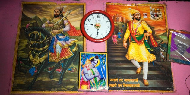 Poster of Shivaji and Ram Hugging Hanuman on the wall interior village Salunkhewadi, near Ghat Nandur, Marathwada Mharashtra India Southeast Asia