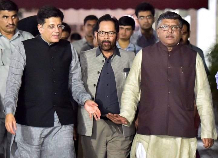 New Delhi: Union ministers Ravishanker Prasad, Piyush Goyal, Mukhtar Abbas Naqvi and other BJP leaders coming out of the Election Commission of India, in New Delhi on Tuesday. A BJP delegation comprising of many central ministers met the election commission over RS polls in Gujarat. PTI Photo by Kamal Kishore (PTI8_8_2017_000141B)