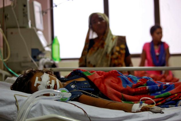 A child is seen in the Intensive care unit in the Baba Raghav Das hospital in Gorakhpur district, India August 13, 2017.