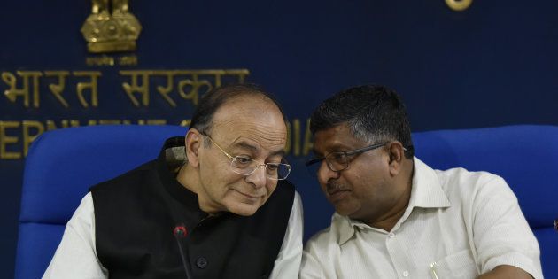 Finance Minister Arun Jaitley with Union Minister holding Law and Justice and Ministry of Information Technology Ravi Shankar Prasad.