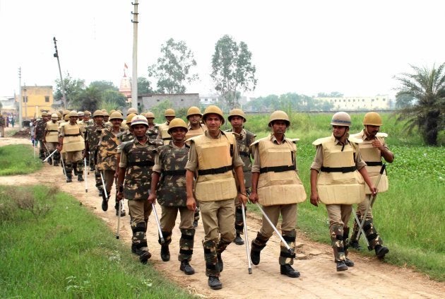 Police in Bisada village at Dadri after accused Ravi dies in Delhi hospital, on October 5, 2016 in Greater Noida, India.