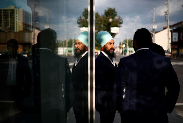 NDP leadership candidate Jagmeet Singh speaks with people at a meet and greet event in Hamilton, Ont. on July 17, 2017.