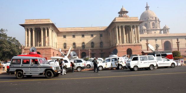Media OB Vans (Vehicles) outside the North Block, in Delhi, India.