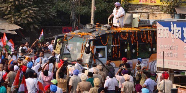 Punjab Chief Minister Capt. Amarinder Singh waves during a road show in favour of Congress candidate for Gurdaspur Lok Sabha bypoll Sunil Jakhar on October 9, 2017 in Gurdaspur, India.