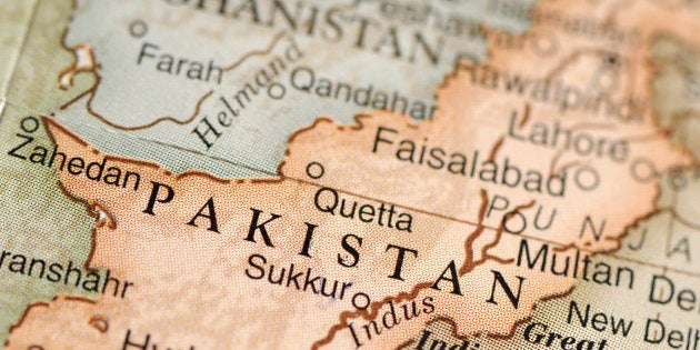 A close-up/macro photograph of Pakistan from a desktop globe. Adobe RGB color profile.