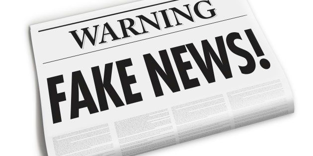 Front page of newspaper with fake news headline and dummy texts isolated on white