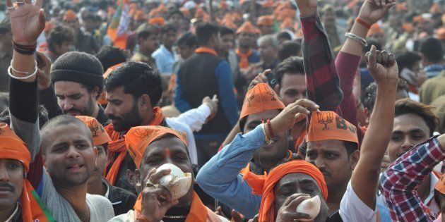 FILE PHOTO: People gather at an election campaign rally at Barabanki on February 16, 2017 near Lucknow, India.