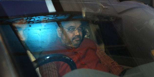 NEW DELHI, INDIA - DECEMBER 30: BJP President Amit Shah leaves after Delhi state BJP working committee meeting at Delhi unit BJP Office on December 30, 2014 in New Delhi, India. A special CBI court in Mumbai discharged BJP president Amit Shah from Sohrabuddin Sheikh and Tulsiram Prajapati fake encounter killing cases, holding there existed no case against him and that he had been implicated for political reasons.