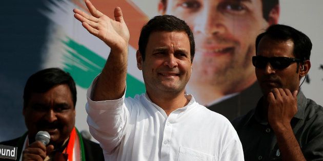 Rahul Gandhi, Vice-President of India's main opposition Congress Party, waves to his supporters during a rally ahead of Gujarat state assembly elections, at a village on the outskirts of Ahmedabad, India November 11, 2017.