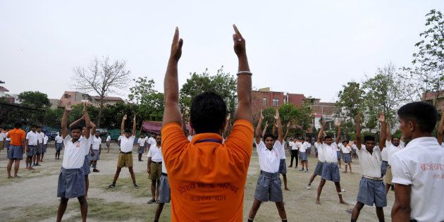 Members of Bajrang Dal doing drills during a self-defense training camp at Saraswati Shishu Mandir, an RSS-run school, on May 26, 2016 in Noida.