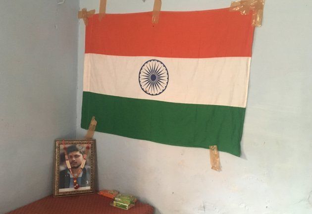 Chandan Gupta's framed photograph at his home in Kasganj.