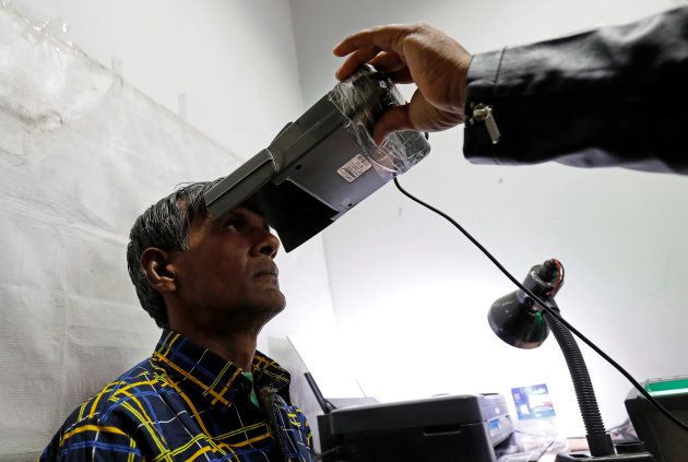 A man goes through the process of eye scanning for the Unique Identification (UID) database system, also known as Aadhaar, at a registration centre in New Delhi, India, January 17, 2018.