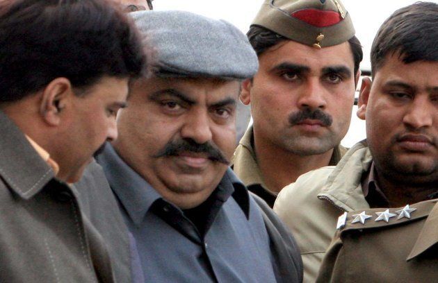 Atique Ahmed, named in several cases of crimes like murder, kidnapping and extortion, produced at Tis Hazari Court in New Delhi in February, 2008.