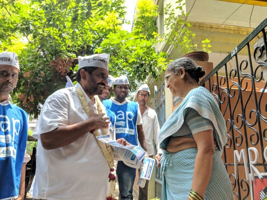 Prithvi Reddy during a door-to-door campaign to meet voters at Sarvagnanagar constituency.