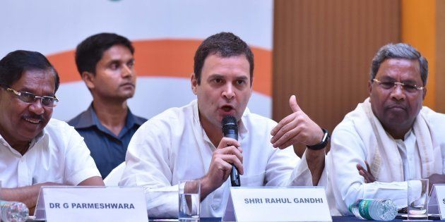 BENGALURU, INDIA - MAY 10: All India Congress Committee president Rahul Gandhi flanked by Karnataka Pradesh Congress Committee president G Parmeshwara (L) and Karnataka Chief Minister Siddaramaiah (R) during a press conference on the last day of campaigning ahead of state assembly election at a city hotel on May 10, 2018 in Bengaluru, India. (Photo by Arijit Sen/Hindustan Times via Getty Images)