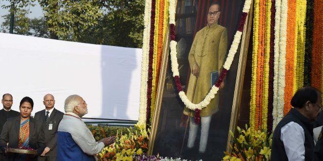 Prime Minister Narendra Modi paying tribute to Dr B.R. Ambedkar on his 61st mahaparinirvan diwas (Death anniversary), at Parliament house, on December 6, 2017 in New Delhi, India. Dr Ambedkar remembered for his triumphant struggle against age-old social discrimination against Dalits, women and labour classes. (Photo by Arvind Yadav/Hindustan Times via Getty Images)