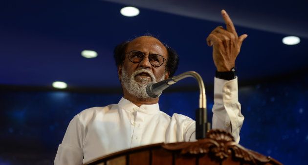 Indian film actor Rajinikanth gestures as he announces his entry in politics during an interaction session with fans in Chennai on December 31, 2017. Rajinikanth, the wildly popular Indian cinema star who inspires almost godlike adulation in some parts of the country, announced his entry into politics on December 31. / AFP PHOTO / ARUN SANKAR (Photo credit should read ARUN SANKAR/AFP/Getty Images)