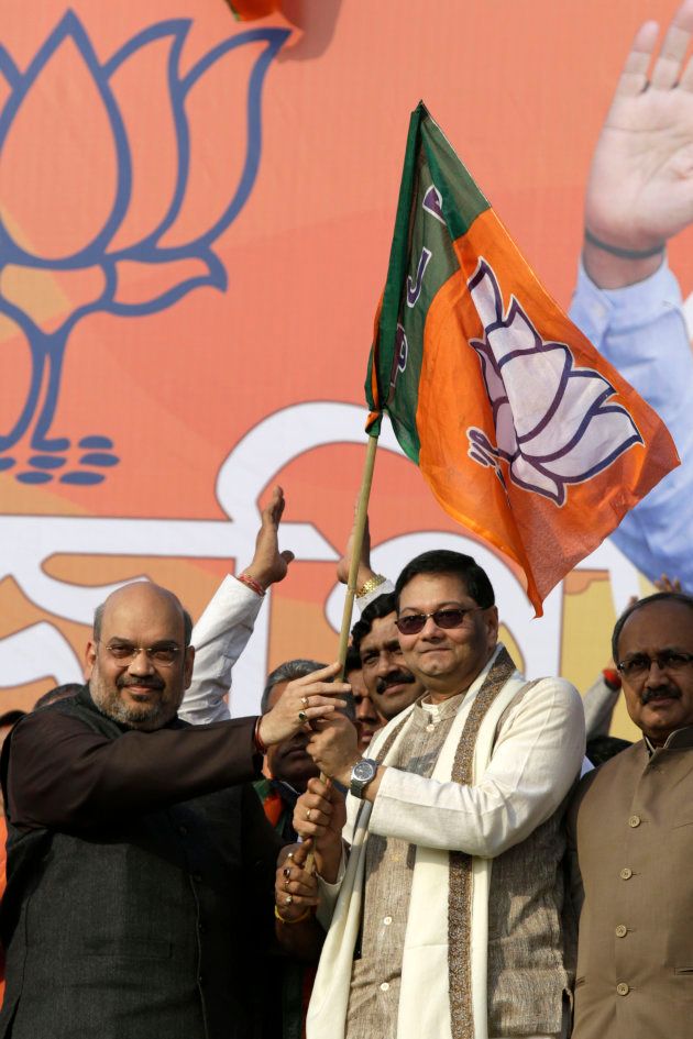 Chandra Bose (right) with Amit Shah in a file photo from three years ago.