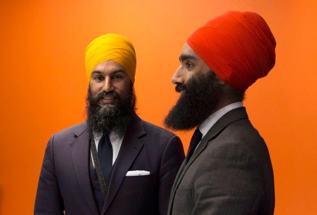 NDP leader Jagmeet Singh and his brother Gurratan Singh pose for a photo at the party offices in Ottawa on Oct. 25, 2017.