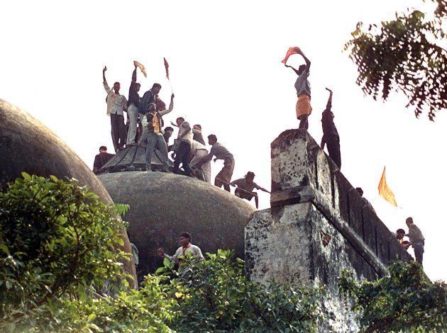 Hindu right-wingers on top of the Babri Masjid on 6 December 1992, five hours before the structure was completely demolished.