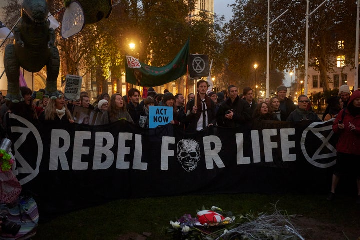 Environmental activists gather in Parliament Square, London, the U.K., during a demonstration organised by the movement Extinction Rebellion on Nov. 24, 2018.