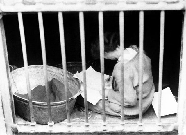 Constance Markievicz seen through a cellar window in Liberty hall after her surrender to the British Army following the Easter Rising