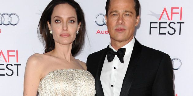 HOLLYWOOD, CA - NOVEMBER 05: Angelina Jolie and Brad Pitt attend the premiere of 'By the Sea' at the 2015 AFI Fest at TCL Chinese 6 Theatres on November 5, 2015 in Hollywood, California. (Photo by Jason LaVeris/FilmMagic)