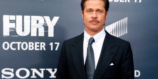 Cast member Brad Pitt arrives on the red carpet at the premiere of World War II film