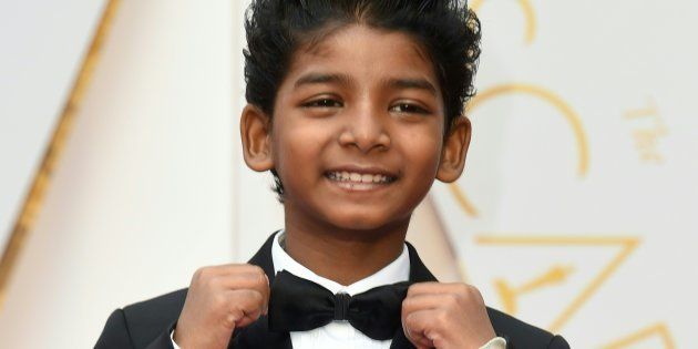 Sunny Pawar arrives on the red carpet for the 89th Oscars. 