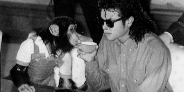 Michael Jackson sips tea with Bubbles on Sept. 18, 1987, in Osaka, Japan.
