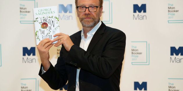 Author George Saunders poses for photographs during a photo-call in London for the six Man Booker shortlisted fiction authors, on the eve of the prize giving in London.