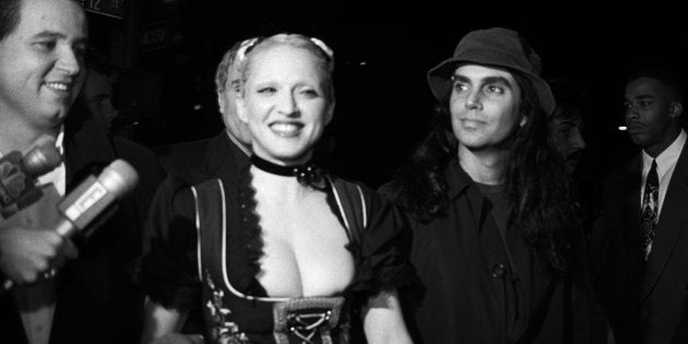 Madonna and photographer Steven Meisel arrive at a New York party for