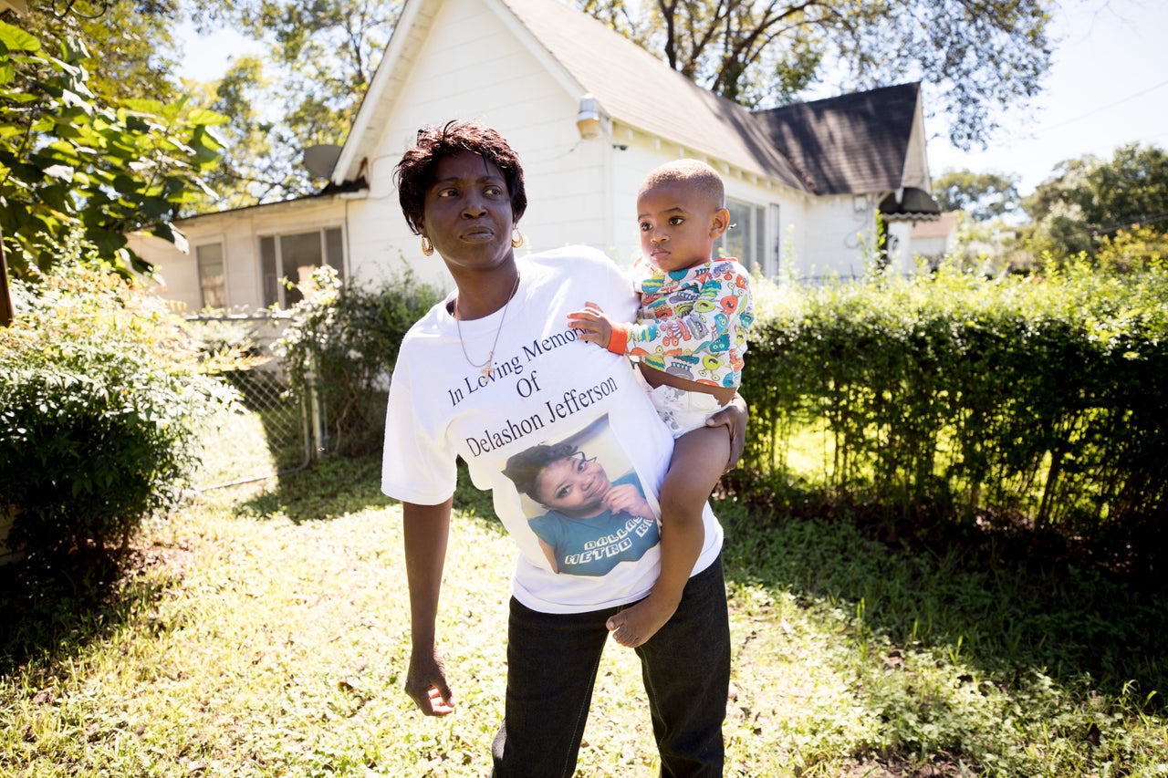 Sharon Jefferson holds her grandson, Rayray. Police say her pregnant daughter, Delashon, was fatally shot by her boyfriend in September.