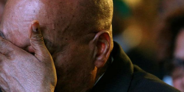 South Africa's President Jacob Zuma reacts during the official announcement of the municipal election results in Pretoria on Saturday, which saw his ANC party lose its grip on local government.