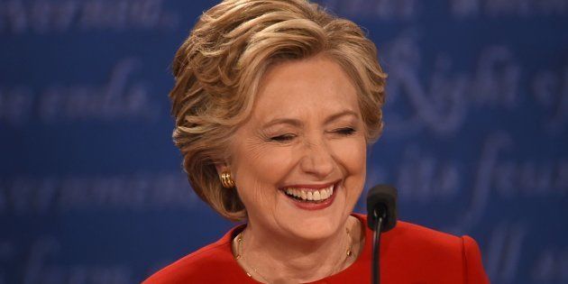 Hillary Clinton, laughing in the face of moronic men everywhere.