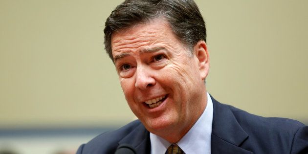FBI Director James Comey testifies before a House Oversight and Government Reform Committee on the