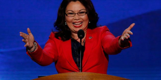 U.S. congressional candidate Tammy Duckworth (D-IL), former Assistant Secretary of the U.S. Department of Veterans Affairs, who lost both of her legs to injuries sustained while serving as a U.S. Army helicopter pilot in combat in Iraq, gestures as she addresses delegates during the first day of the Democratic National Convention in Charlotte, North Carolina, September 4, 2012. REUTERS/Jason Reed (UNITED STATES - Tags: POLITICS ELECTIONS)