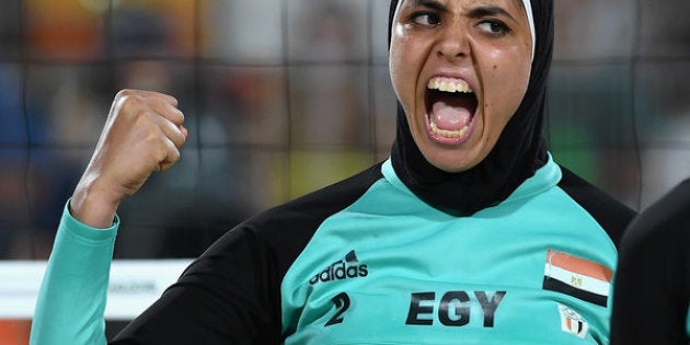 RIO DE JANEIRO, BRAZIL - AUGUST 07: Doaa Elghobashy of Egypt reacts during the Women's Beach Volleyball preliminary round Pool D match against Laura Ludwig and Kira Walkenhorst of Germany on Day 2 of the Rio 2016 Olympic Games at the Beach Volleyball Arena on August 7, 2016 in Rio de Janeiro, Brazil. (Photo by Shaun Botterill/Getty Images)