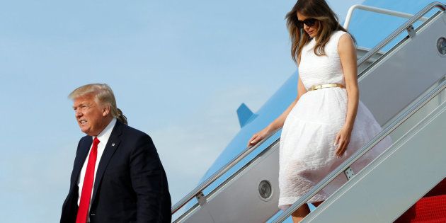 U.S. President Donald Trump and First Lady Melania Trump arrive at Joint Base Andrews outside Washington, U.S., after Easter weekend in Palm Beach, Florida, April 16, 2017. REUTERS/Yuri Gripas