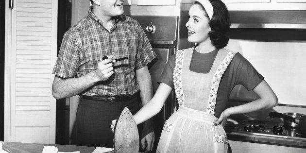 UNITED STATES - CIRCA 1950s: Couple ironing.
