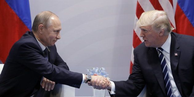 HAMBURG, GERMANY JULY 7, 2017: Russia's President Vladimir Putin (L) and US President Donald Trump shake hands during a bilateral meeting on the sidelines of the G20 summit in Hamburg. Mikhail Metzel/TASS (Photo by Mikhail Metzel\TASS via Getty Images)