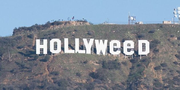 HOLLYWOOD, CA - JANUARY 01: The Iconic Hollywood Sign Gets Changed To Read 'Hollyweed' on January 1, 2017 in Hollywood, California. (Photo by Gabriel Olsen/Getty Images)