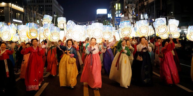 Buddhist believers carrying lanterns march during a Lotus Lantern parade in celebration of the upcoming birthday of Buddha in Seoul, South Korea April 29, 2017.