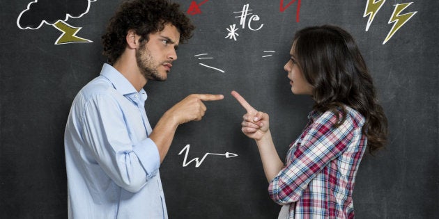 Discussion Between Guy And Girl Over Gray Background