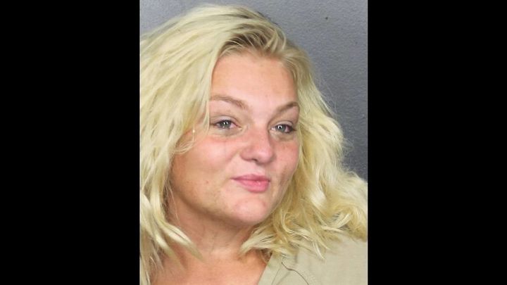 Teresa Gardner, 27, of Pompano Beach, Florida, is accused of stuffing a backpack with four Chihuahuas and slamming against tables and benches at a bar.