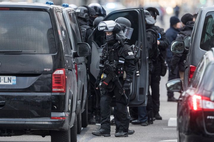 Armed police seen launching an operation in a Strasbourg suburb on Thursday afternoon.