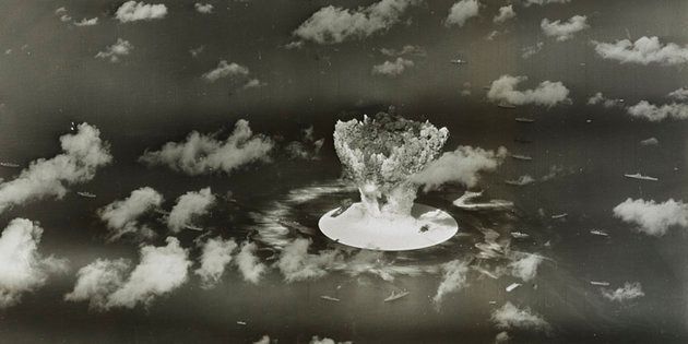 [File photo] A mushroom cloud rises with ships below during Operation Crossroads nuclear weapons test on Bikini Atoll, Marshall Islands, in 1946.