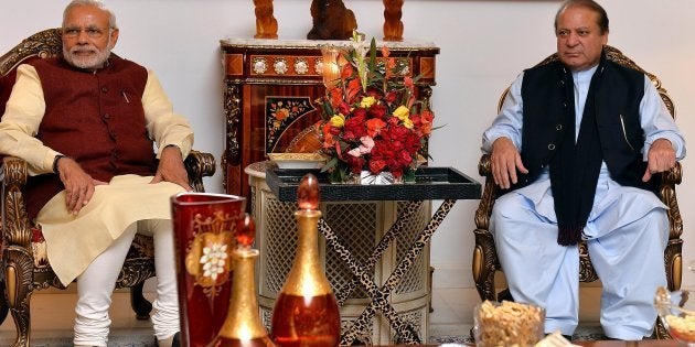 Prime Minister of Pakistan Nawaz Sharif (R) meets with Indian Prime Minister Narendra Modi (L) in Lahore, Pakistan on December 25, 2015. (Photo by Indian Press Information office/Anadolu Agency/Getty Images)