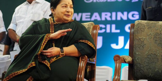 Jayalalithaa Jayaram, leader of All India Anna Dravida Munnetra Kazhagam (AIADMK), takes part in a swearing-in ceremony as chief minister of Tamil Nadu on May 23, 2016. ARUN SANKAR/AFP/Getty Images.