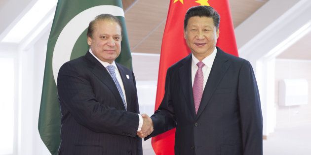 Chinese President Xi Jinping, right, shakes hands with Pakistani Prime Minister Nawaz Sharif in Ufa, Russia, July 10, 2015.